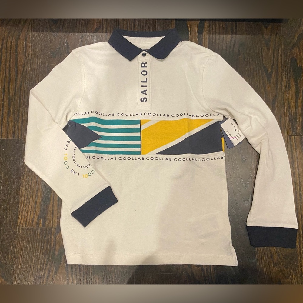 Nukuravake Size 8 long sleeve polo w cool sailor color block detail. NWT.